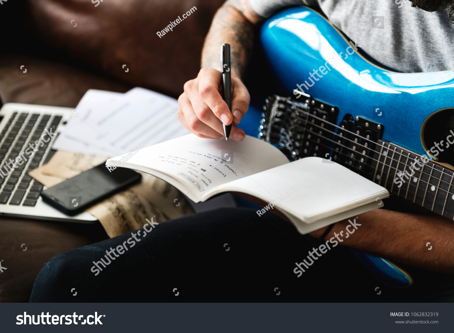 stock-photo-caucasian-man-in-a-songwriting-process-1062832319